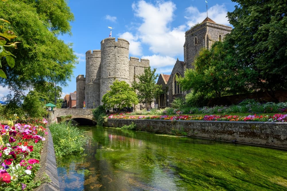 The Westgate Towers and gardens beside the River Stour in Canterbury